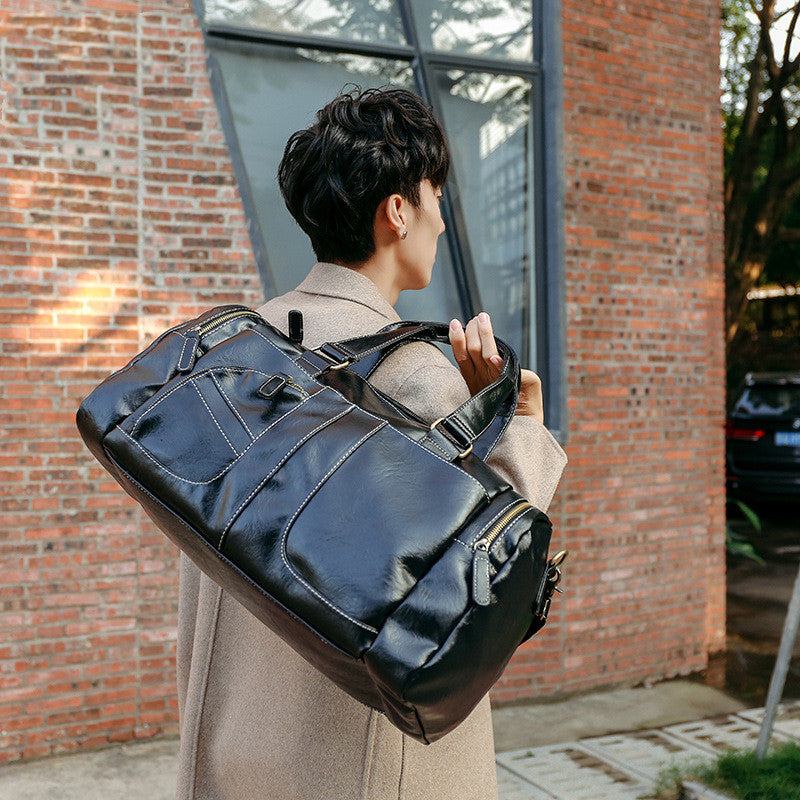 Large black men's fitness travel bag with multiple compartments