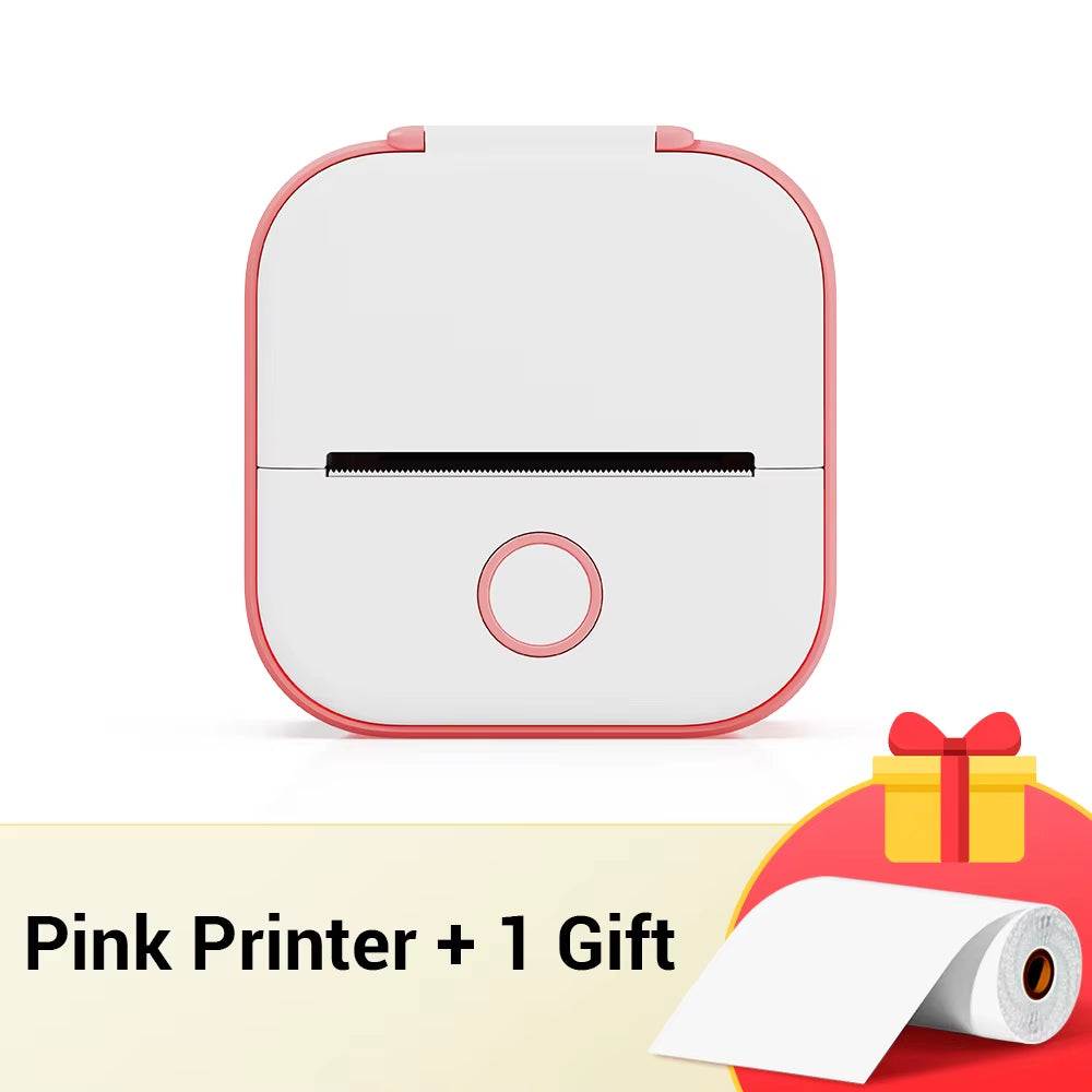 Portable Printer in white and pink plastic with a square shape, circular button, and compact design for mobile use.