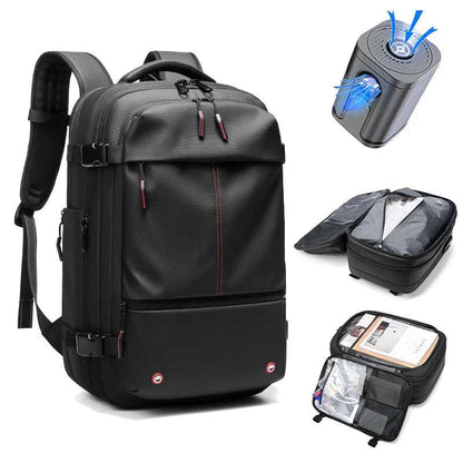 Black waterproof Travel Backpack Vacuum made of Oxford cloth with multiple compartments, side straps, and compression system shown with packing cubes and vacuum pump.