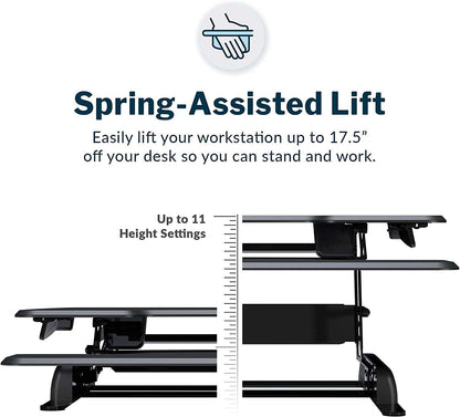 Two-Tier Standing Desk converter in black with spring-assisted lift, dual handles, and adjustable height up to 17.5 inches.