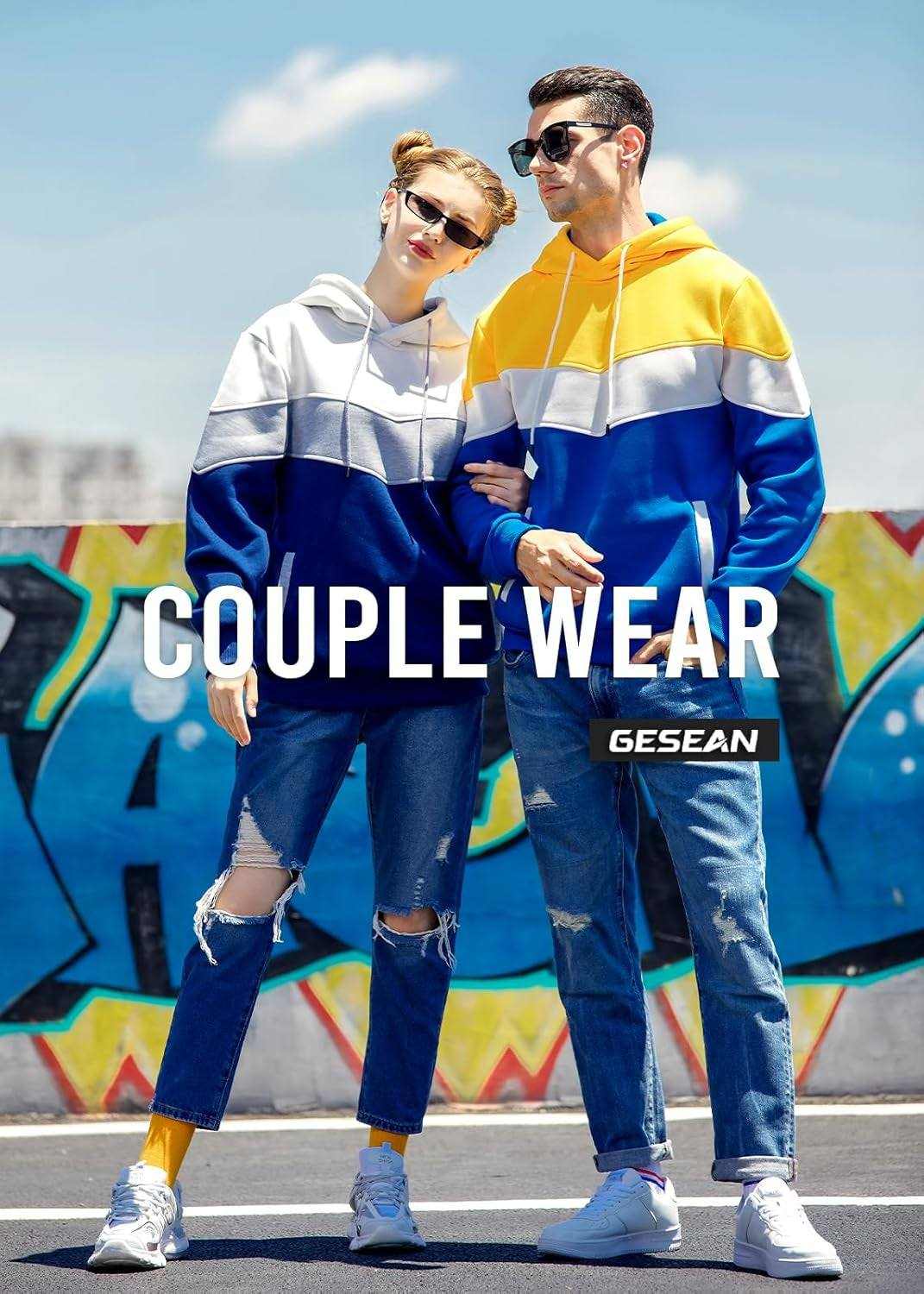 Men and woman wearing matching Color Block Pullover hoodies in white, blue, and yellow with a front pocket and long sleeves
