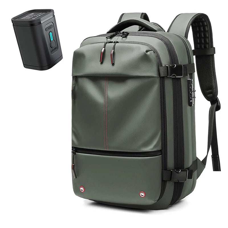 Green waterproof Oxford cloth Travel Backpack Vacuum with multiple compartments, padded shoulder straps, and a separate small black vacuum pump.
