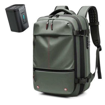 Green waterproof Oxford cloth Travel Backpack Vacuum with multiple compartments, padded shoulder straps, and a separate small black vacuum pump.
