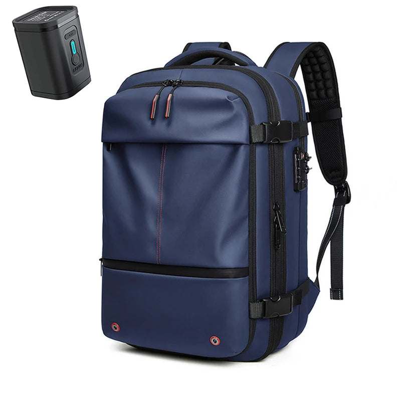 Navy blue Travel Backpack Vacuum made of waterproof material, featuring multiple compartments, padded shoulder straps, and a compression device.