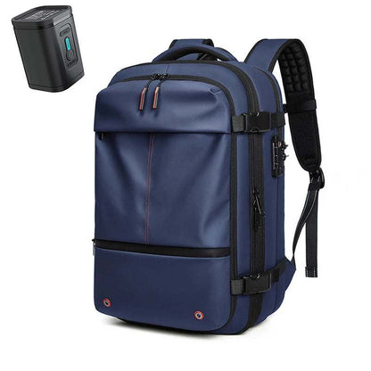 Navy blue Travel Backpack Vacuum made of waterproof material, featuring multiple compartments, padded shoulder straps, and a compression device.