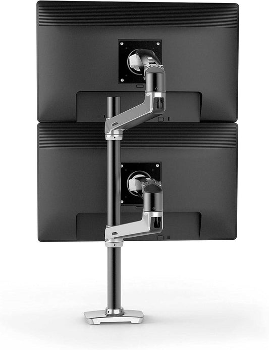 LX Vertical Stacking Dual Monitor Arm in polished aluminum holding two black monitors vertically with adjustable arms and desk clamp mount.
