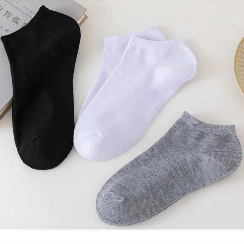 Women/Men Boat Socks in black, white, and grey spandex fabric with an invisible low cut and no-show design