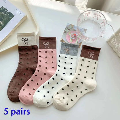 Women/Men Boat Socks in brown, pink, white, and cream with polka dots and bow embroidery on the cuff