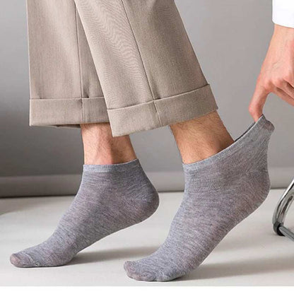 Grey cotton blend invisible low-cut Women/Men Boat Socks with elastic ankle cuff worn by a person