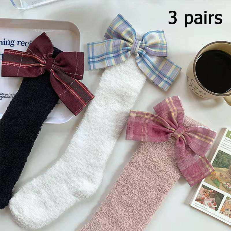 Women/Men Boat Socks set of three fuzzy socks in black, white, and pink with large plaid fabric bows